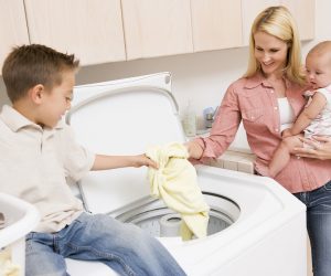 Laundry Mother Helping Son Washing Machine Baby Chores 30s 7 Year Old Assistance Assisting Boy Casual Clothing Caucasian Cheerful Child Cleaning Color Colour Domestic Elementary Age Family Holding Home Horizontal Housework Image Indoors Laundry Basket Mid